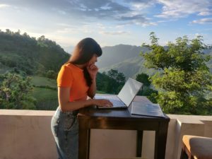 women working remotely with view