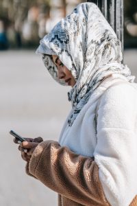 woman on mobile phone outdoors