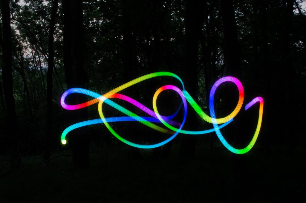 rainbow color squiggle appears to be in a park